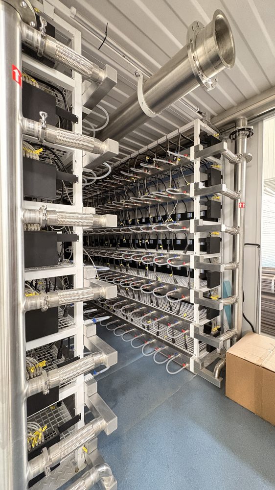 Immersion cooling systems at a supplier facility
